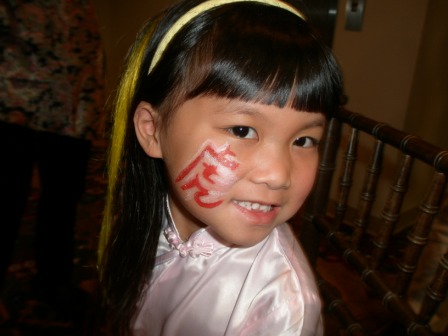 Kasen with her face painted